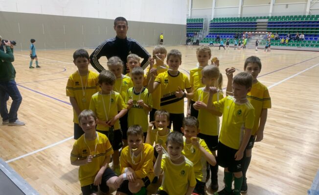 Futbola komanda ar treneri